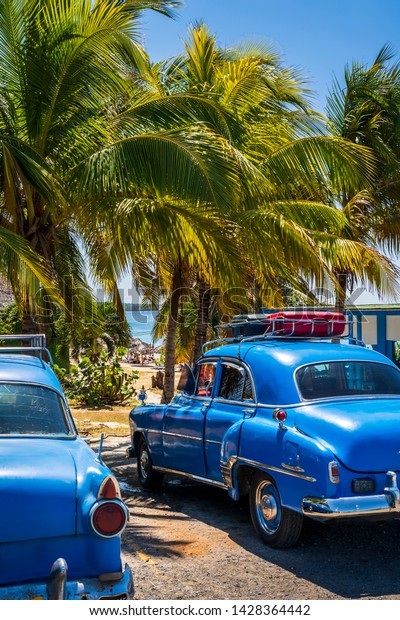 Cienfuegos, Cuba - March 22 2019: Tourist
luggage bags on the roof rack's of an old american vintage car.
Cienfuegos, Cuba, West Indies, Caribbean, Central
America