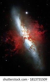 Cigar Galaxy, Also Known As Messier 82, Is An Edge-on Starburst Galaxy Located In The Constellation Ursa Major.