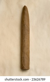 Cigar On An Old Piece Of Paper.