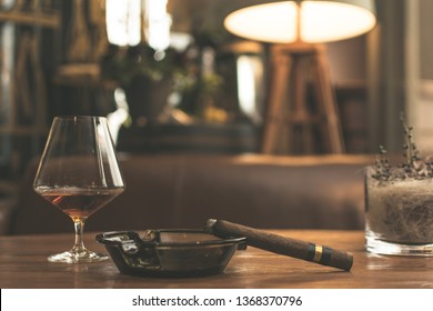 Cigar On A Table With Whiskey On A Side, Cigar Room Representation. 