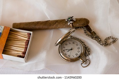 Cigar With A Ring Instead Of Vitola And A Pocket Watch.