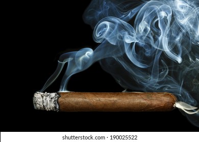 Cigar With Smoke On Black Background