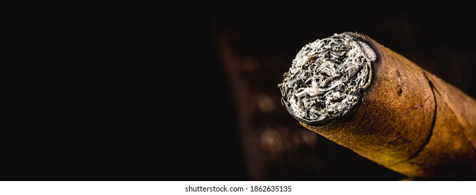 Cigar Tip Detail, Isolated On Dark Background