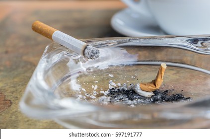 Cigarette in the ashtray/cigarette/smoking - Powered by Shutterstock