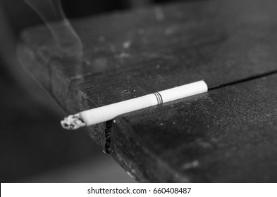 Cigarette Burn On Wooden Table Black Stock Photo 660408487 | Shutterstock