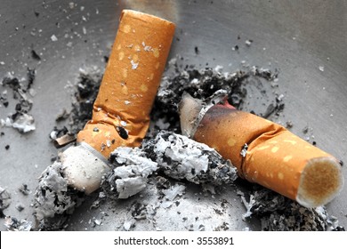 Cigarette butt in the ashtray,  unhealthy life style concept