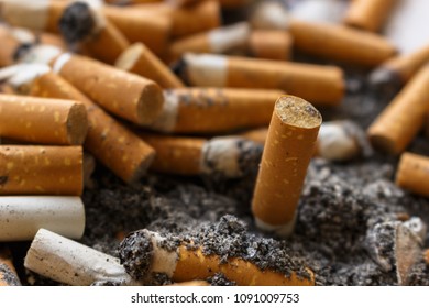 Cigarette butts macro unhealt concept. 