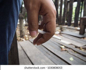 Cigarette in hand