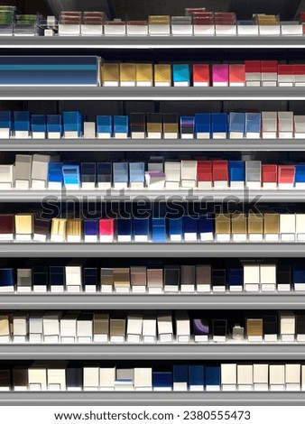 Cigarette packs at cash counter. Vertical photo, mockup, illustration. Ideal for graphic designers, architects and interior designers. Can also be used for planograms and schematics. 