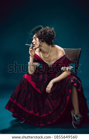 Similar – Image, Stock Photo smoke Young woman portrait