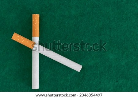 Cigarettes of cross on white background.stop smoking