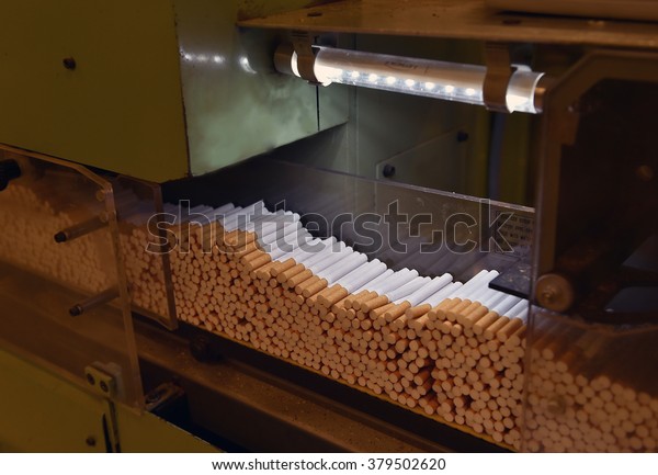 \
Cigarettes production line in a tobacco\
factory