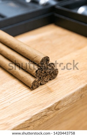 Cigars on a table before wedding