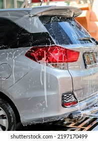 Cilegon, Indonesia - Sep 03, 2022 : A Car With Snow Foam Car Wash. Photo Illustration Of Car Wash. Perfect For Articles Or Any Marketing Purposes.