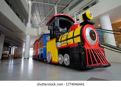Cileungsi, Bogor, Indonesia (November 21st, 2016)

Small locomotive pulling a train as a toy facility for children in a mall in Cileungsi, Bogor.