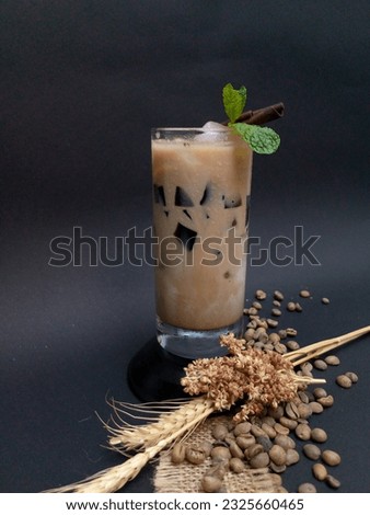 Cincau Ice Cappucino, a refreshing drink with a cappuccino composition, black grass jelly pieces and ice cubes