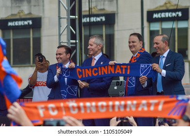 CINCINNATI, OH - MAY 29, 2018: (L-R) John Cranley, Carl H. Lindner III, Jeff Berding And Don Garber Unveil The MLS Scarf For FC Cincinnati At Fountain Square.