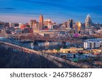 Cincinnati, Ohio, USA. Aerial cityscape image of Cincinnati, Ohio, USA downtown skyline with bridges and Ohio River at spring sunset.