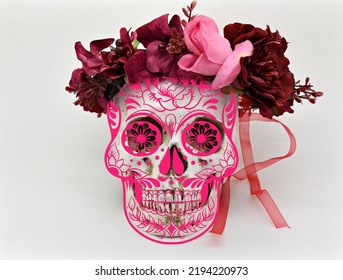 Cinco De Mayo Celebration Image Of Human Skull With Pink Mask Overlay And Flower Head Dress