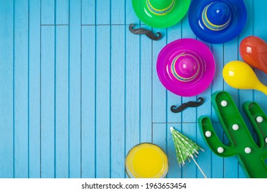 Cinco De Mayo Holiday Background With Mexican Cactus And Party Sombrero Hat On Wooden Board