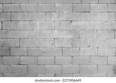 Cinder block wall background texture. Grunge backdrop wallpaper