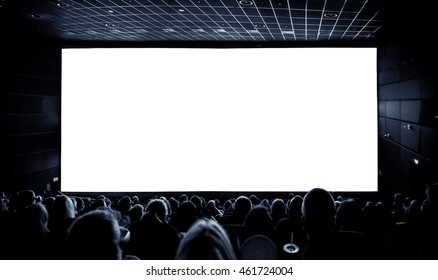 Cinema. The audience in 3D glasses watching a movie. A white screen for your image. - Shutterstock ID 461724004