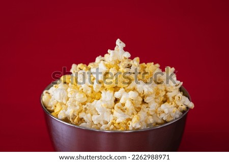 Similar – Striped box with popcorn on yellow background.