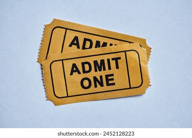 Cinema, entertainment and movie ticket against white background for date night, fun and admission. Paper, token and theatre customer proof of payment for film, show or artistic stage performance - Powered by Shutterstock