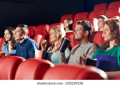 Cinema, Entertainment And People Concept - Happy Friends Watching Movie In Theater