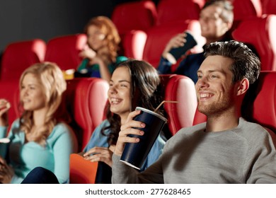 Cinema, Entertainment And People Concept - Happy Friends Watching Movie In Theater