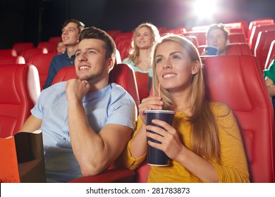 Cinema, Entertainment And People Concept - Happy Friends Watching Movie In Theater