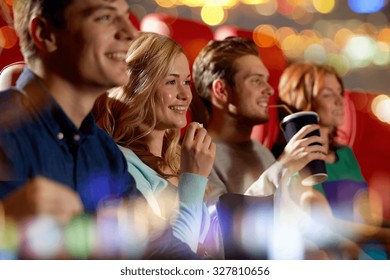 Cinema, Entertainment And People Concept - Happy Friends Watching Movie In Theater