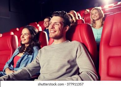 Cinema, Entertainment And People Concept - Happy Friends Watching Movie In Theater