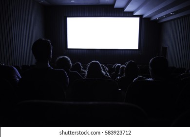 Cinema White Screen With Seats And People Silhouettes