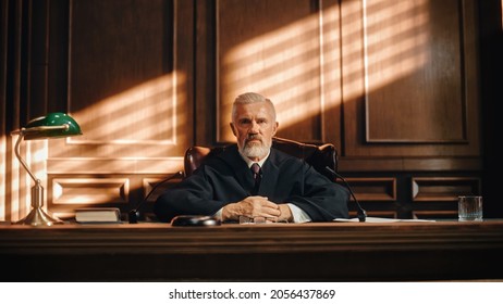 Cinematic Court of Law and Justice Trial: Portrait of Impartial Male Judge Listening To the Pleaded Case. Unbiased Decision after Hearing Arguments. Deliberation on Guilty, Not Guilty Verdict.