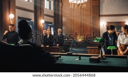 Cinematic Court of Law and Justice Trial: Female Judge Ruling Out a Decision in a Civil Family Case, Striking Gavel to Close Hearing. Convicted Male Defendant is Heartbroken, Lawyer Provides Support.