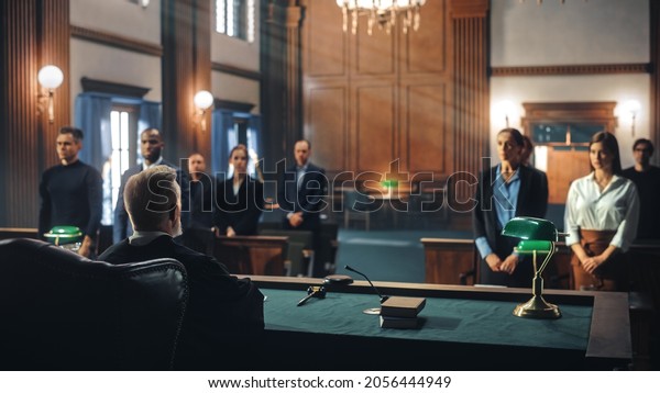 Cinematic Court of Law and Justice Trial: Male\
Judge Ruling Out a Decision in a Civil Family Case, Striking Gavel\
to Close Hearing. Convicted Male Defendant is Heartbroken, Lawyer\
Provides Support.