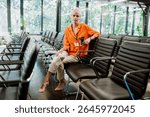 Cinematic image of a conference meeting. Business people sitting in a room listening to the motivator coach. Representation of a Self growth and improvement special event