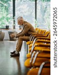 Cinematic image of a conference meeting. Business people sitting in a room listening to the motivator coach. Representation of a Self growth and improvement special event