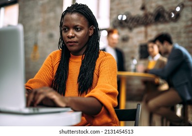 Cinematic Image Of   Employers Working In A Start Up Business. Young People At Work In A Modern Office