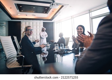 Cinematic Image Of A Multiethnic Business Team Working Together In Dubai In Offices. Concept About Finance, Investments And Real Estate Market