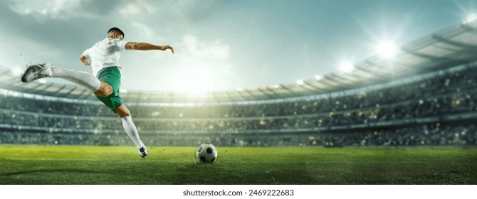 Cinematic image of penalty. Focused on game, running soccer, football player at stadium during decisive, final match. Concept of professional sport, championship, tournament, movement. Ad - Powered by Shutterstock