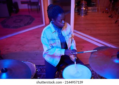 Cinematic Portrait Of Black Female Drummer Playing Music In Live Studio Performance, Copy Space