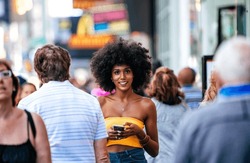 Cinematic Portraits Of A Beautiful American Young Woman With Curly Hair In New York. Concept About New Yorkers Lifestyle And People