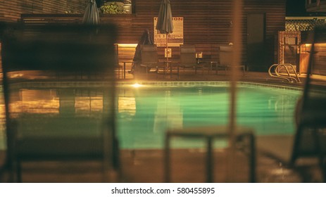 Cinematic View Of California Motel Swimming Pool At Night