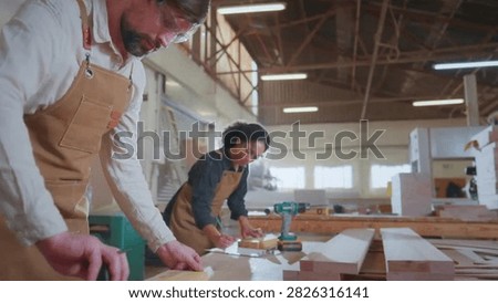 Cinematic View Of Carpentry Workshop Team Working