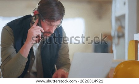 Cinematic View Of Man Working in Carpentry Workshop