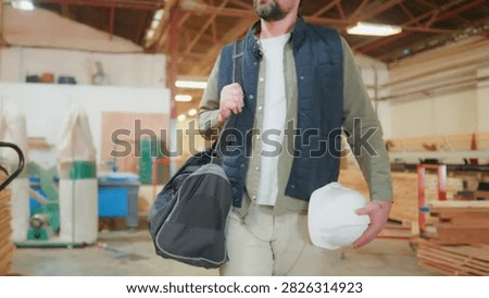 Cinematic View Of Man Working in Carpentry Workshop
