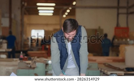 Cinematic View Of Man Working in Carpentry Workshop