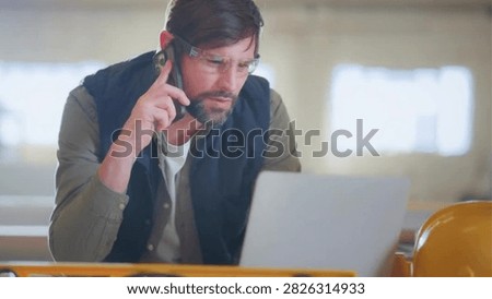 Cinematic View Of Man Working in Carpentry Workshop